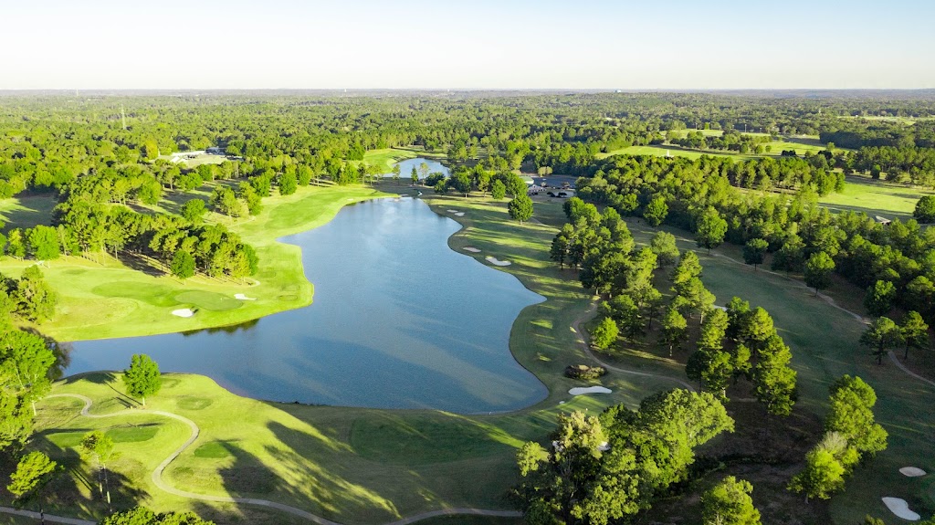 Panoramic view of a lush green golf course at Ol' Colony Golf Complex. Smooth