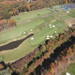 Panoramic view of a lush green golf course at Old Bridge Golf Course - The Rose. Smooth
