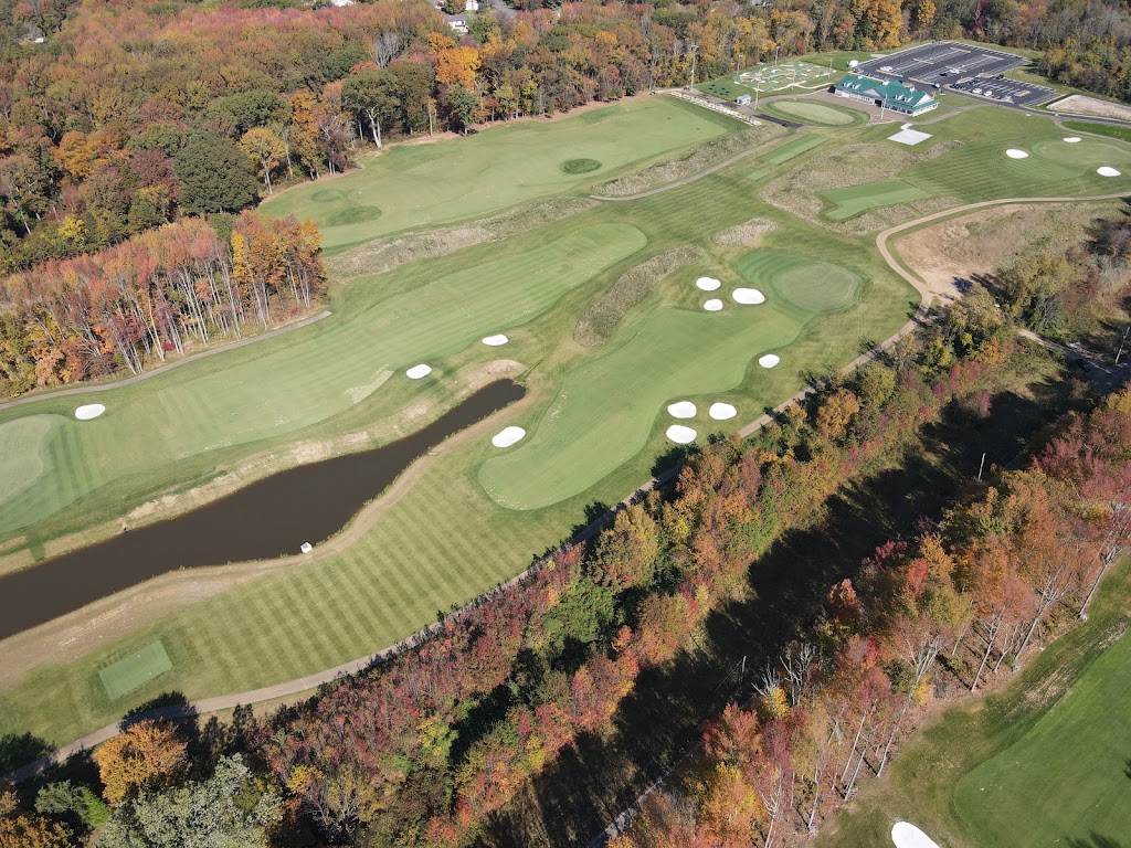 Panoramic view of a lush green golf course at Old Bridge Golf Course - The Rose. Smooth