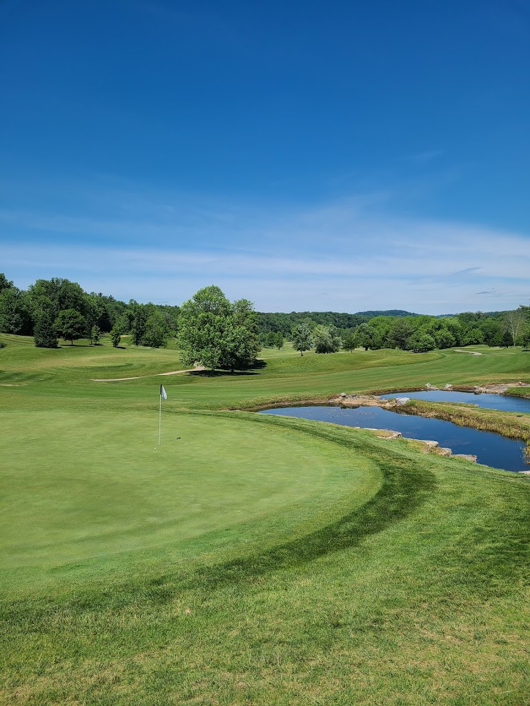 Panoramic view of a lush green golf course at Old Capital Golf Club. Smooth