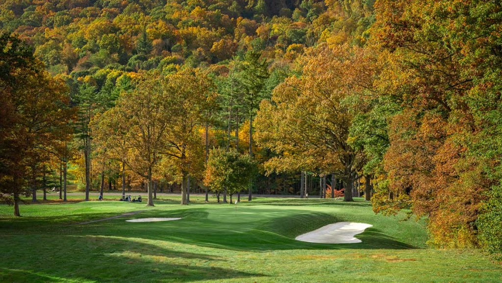 Panoramic view of a lush green golf course at Old Course at The Omni Homestead Resort & Spa. Smooth
