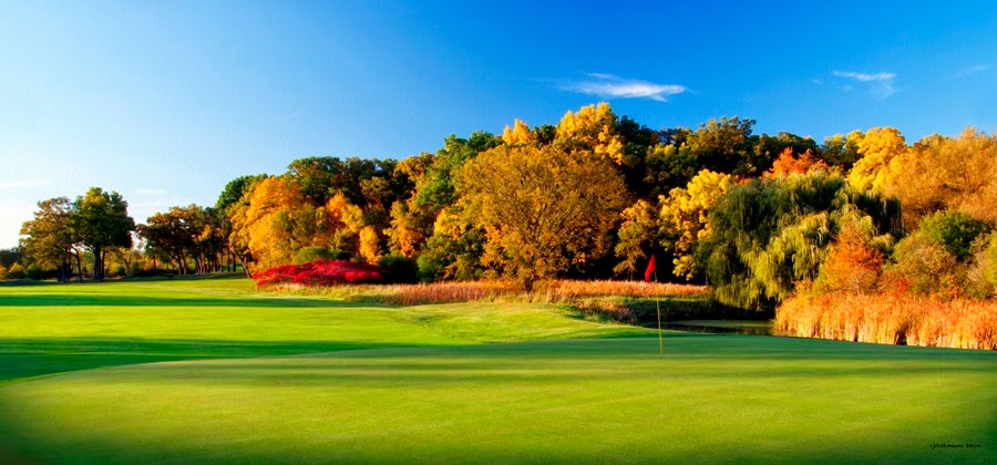 Panoramic view of a lush green golf course at Old Hickory Golf Club. Smooth