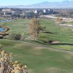 Panoramic view of a lush green golf course at Old Mill Golf Course. Smooth