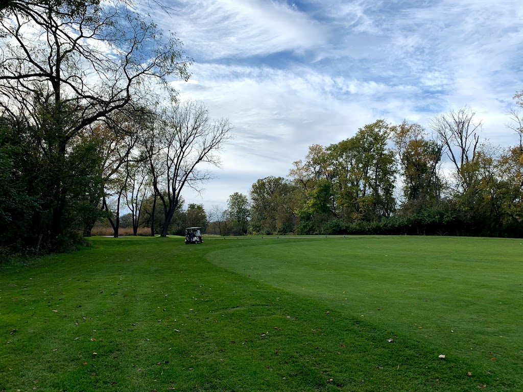 Panoramic view of a lush green golf course at Old Oak Country Club. Smooth