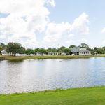 Panoramic view of a lush green golf course at Old South Golf Links. Smooth
