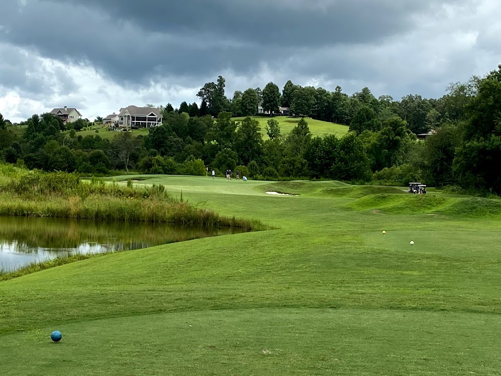 Panoramic view of a lush green golf course at Old Union Golf Course. Smooth