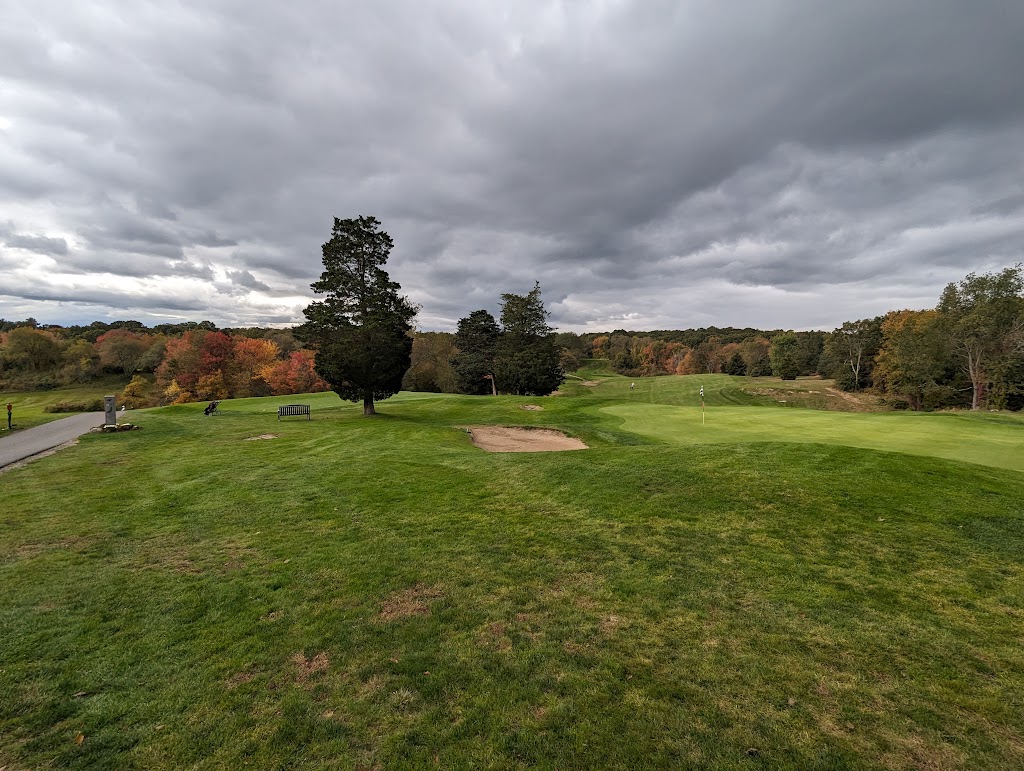 Panoramic view of a lush green golf course at Olde Salem Greens Golf Course. Smooth