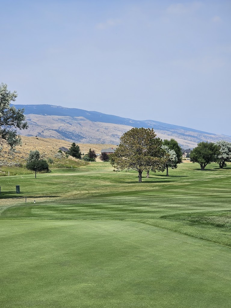 Panoramic view of a lush green golf course at Olive Glenn Golf Club. Smooth