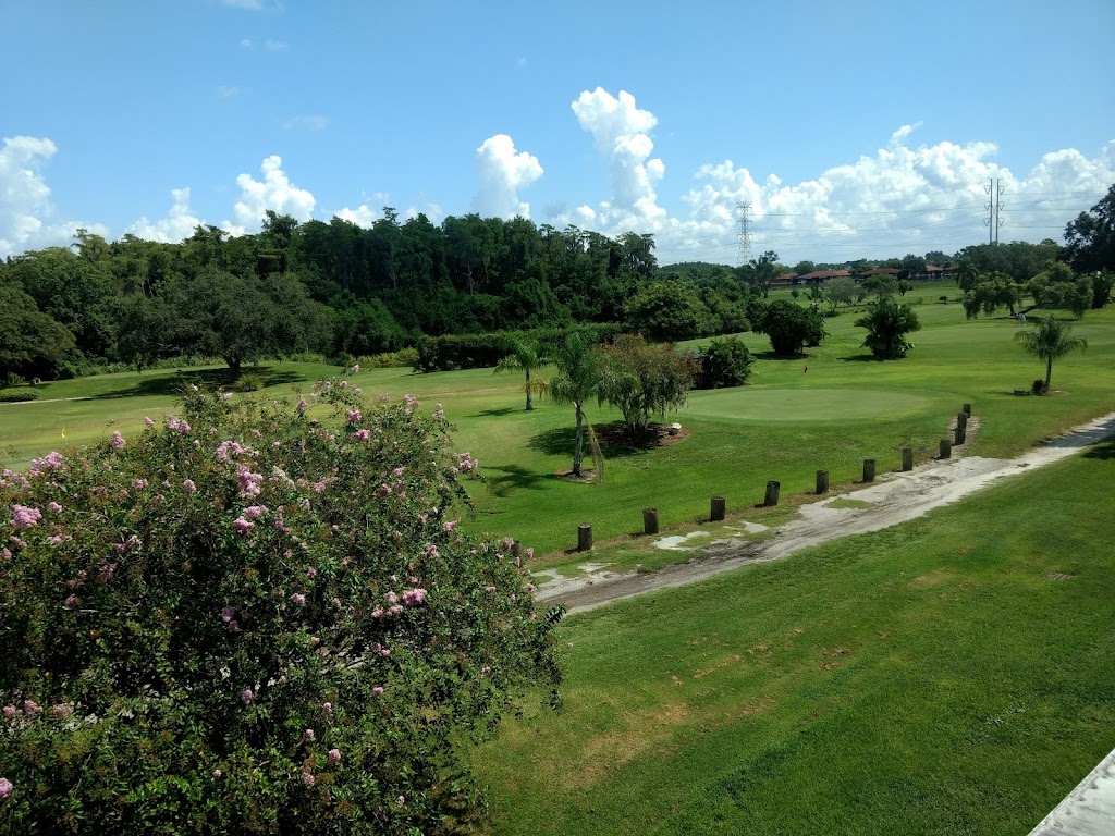 Panoramic view of a lush green golf course at On Top of the World Golf Course. Smooth