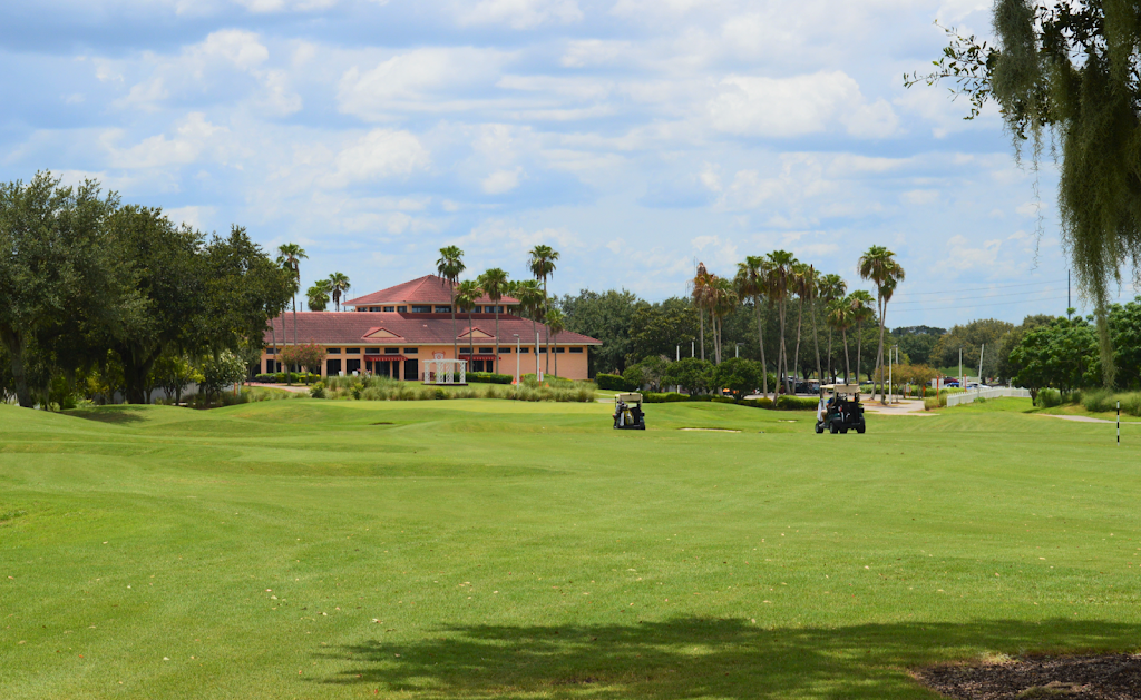 Panoramic view of a lush green golf course at Orange County National Golf Center and Lodge. Smooth