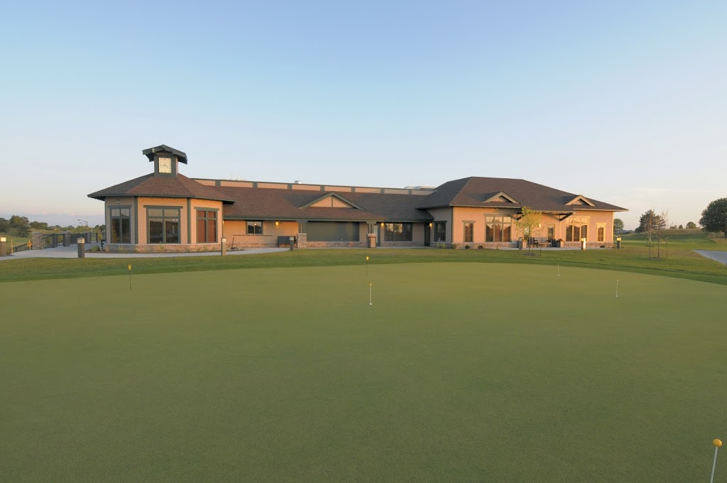 Panoramic view of a lush green golf course at Otter Creek Golf Course. Smooth