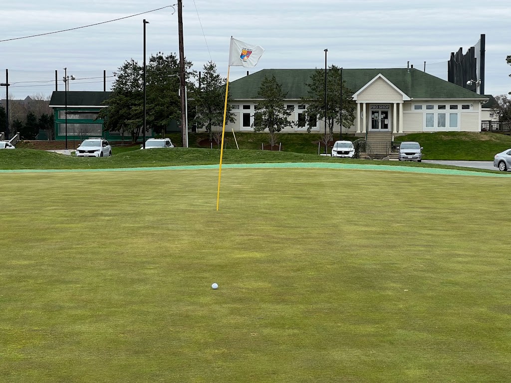 Panoramic view of a lush green golf course at Paint Branch Golf Complex. Smooth