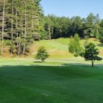 Panoramic view of a lush green golf course at Paintsville Golf Course. Smooth