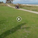 green grass with the flag in the hole.