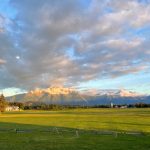 Panoramic view of a lush green golf course at Palmer Golf Course. Smooth