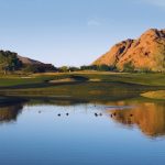 Panoramic view of a lush green golf course at Papago Golf Club. Smooth