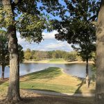 Panoramic view of a lush green golf course at Paradise Valley Athletic Club. Smooth