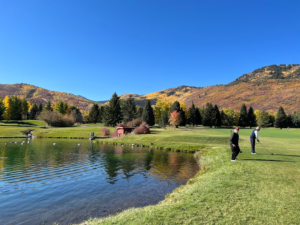 Panoramic view of a lush green golf course at Park City Golf Course. Smooth