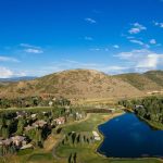 Panoramic view of a lush green golf course at Park Meadows Country Club. Smooth