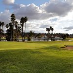 Panoramic view of a lush green golf course at Paso Robles Golf Club. Smooth