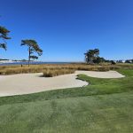 Panoramic view of a lush green golf course at Peninsula Golf & Country Club. Smooth