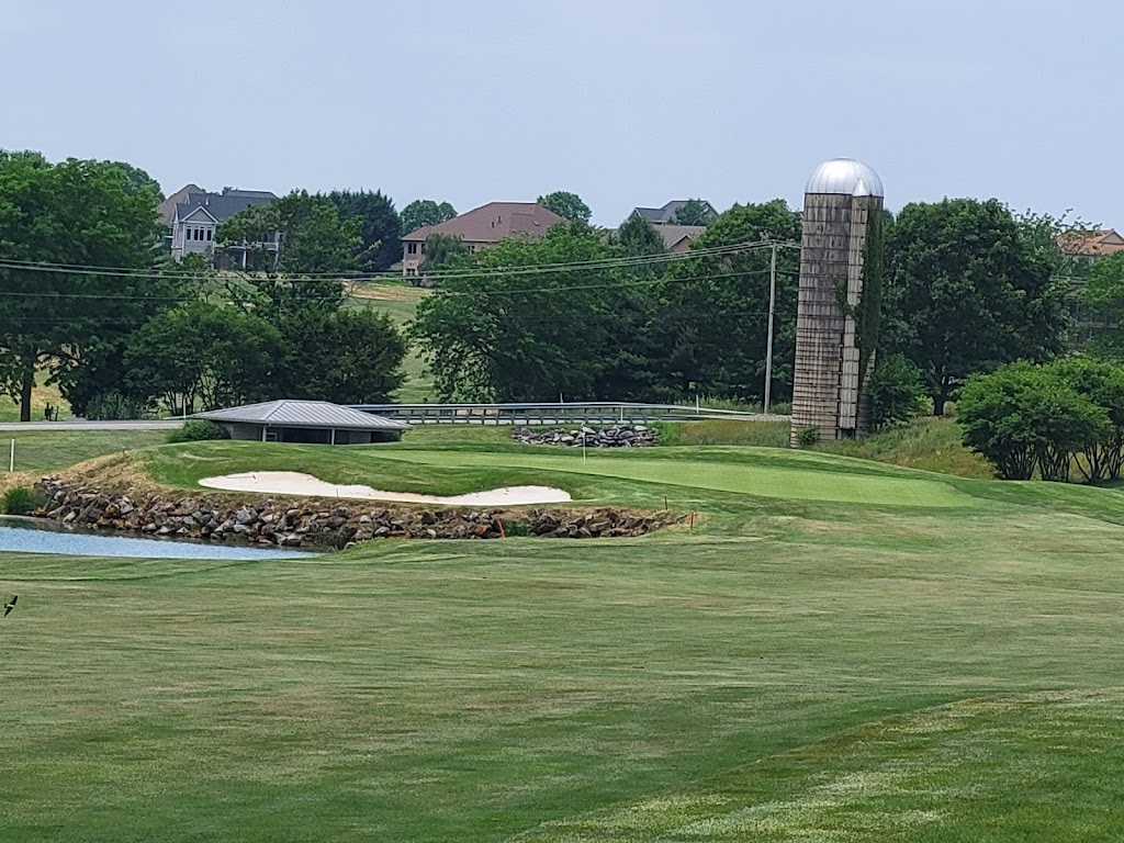 Panoramic view of a lush green golf course at Penn National Golf Club & Inn. Smooth