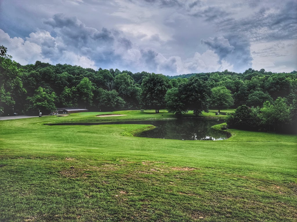 Panoramic view of a lush green golf course at Pennyrile Forest State Resort Park Golf Course. Smooth