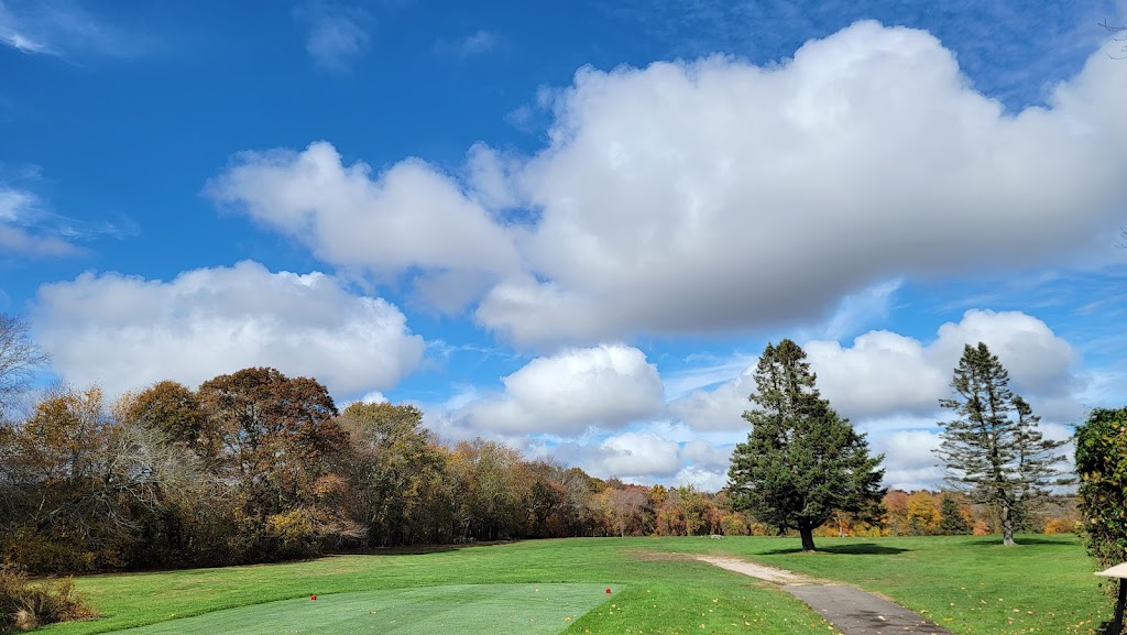 Panoramic view of a lush green golf course at Pequot Golf Club. Smooth