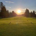 Panoramic view of a lush green golf course at Pinecrest Golf Course. Smooth
