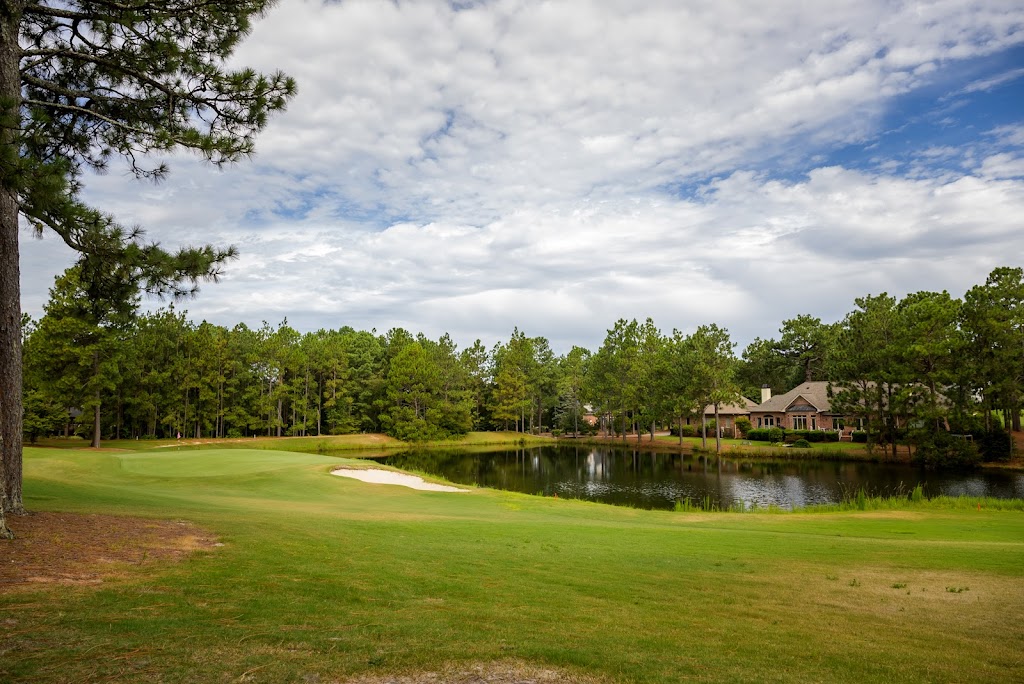 Panoramic view of a lush green golf course at Pinehurst No 6. Smooth
