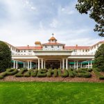 Panoramic view of a lush green golf course at Pinehurst Resort. Smooth
