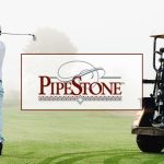 Panoramic view of a lush green golf course at PipeStone Golf Club. Smooth