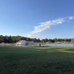 Panoramic view of a lush green golf course at Pleasant Valley Country Club. Smooth