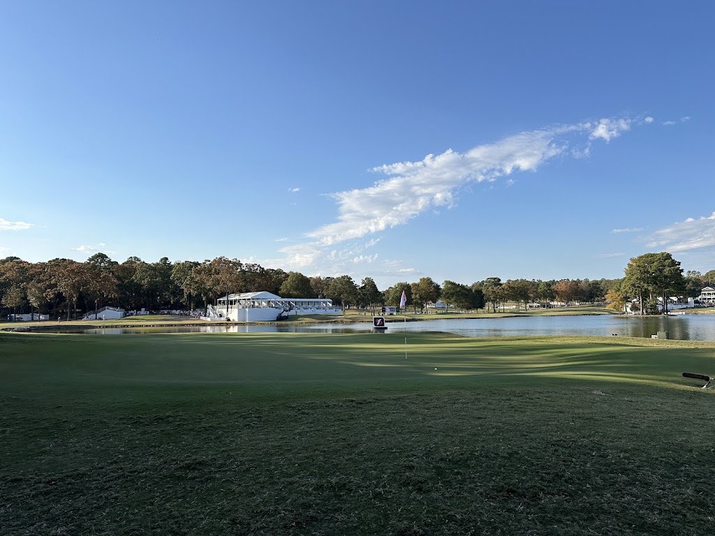 Panoramic view of a lush green golf course at Pleasant Valley Country Club. Smooth