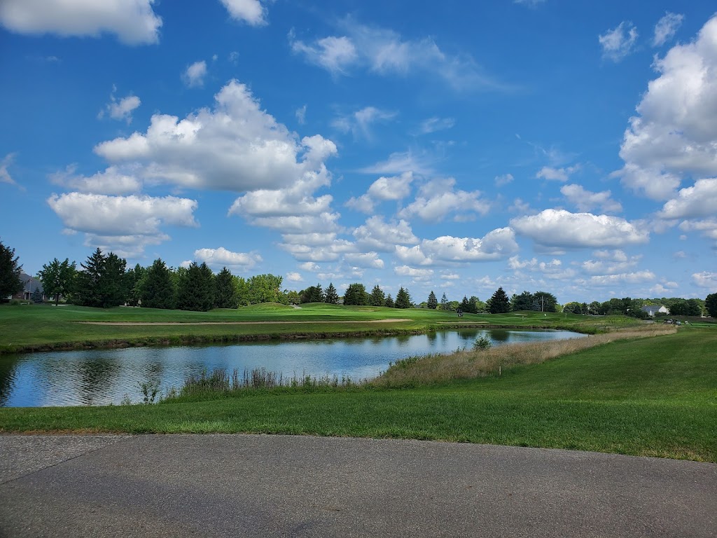 Panoramic view of a lush green golf course at Plum Creek Golf Club. Smooth
