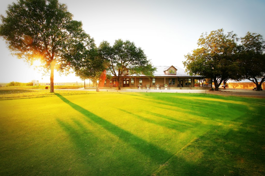 Panoramic view of a lush green golf course at Plum Creek Golf Course. Smooth