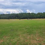 Panoramic view of a lush green golf course at Poplar Forest Golf Course. Smooth