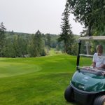 green grass with the flag in the hole.