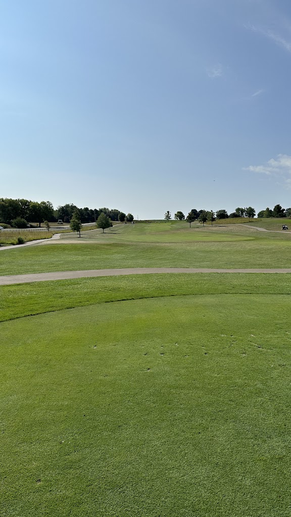 Panoramic view of a lush green golf course at PrairieView Golf Club. Smooth