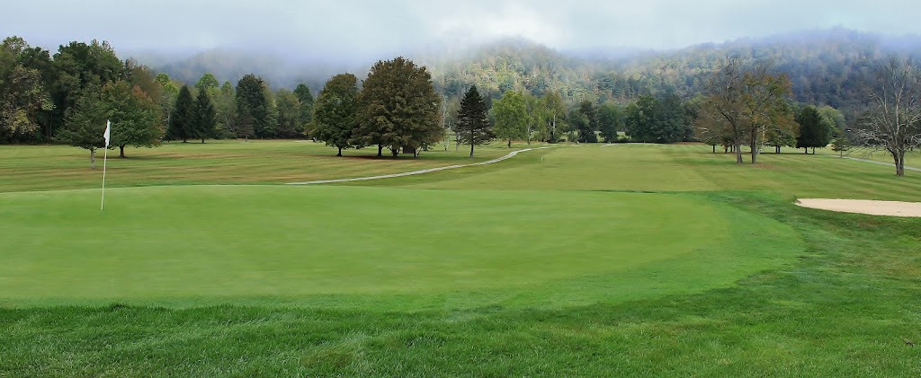 Panoramic view of a lush green golf course at Preston Country Club. Smooth