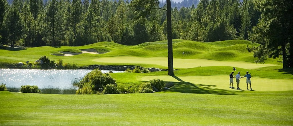 Panoramic view of a lush green golf course at Prospector Golf Course. Smooth