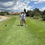 green grass with the flag in the hole.