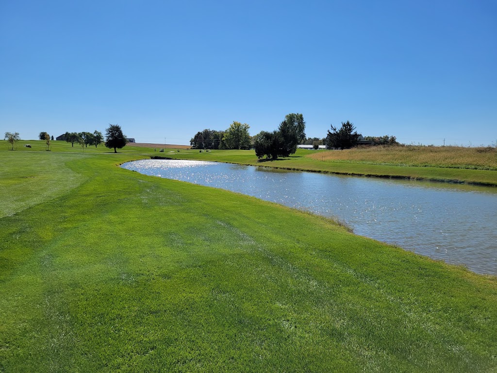 Panoramic view of a lush green golf course at Quail Valley Golf Course. Smooth