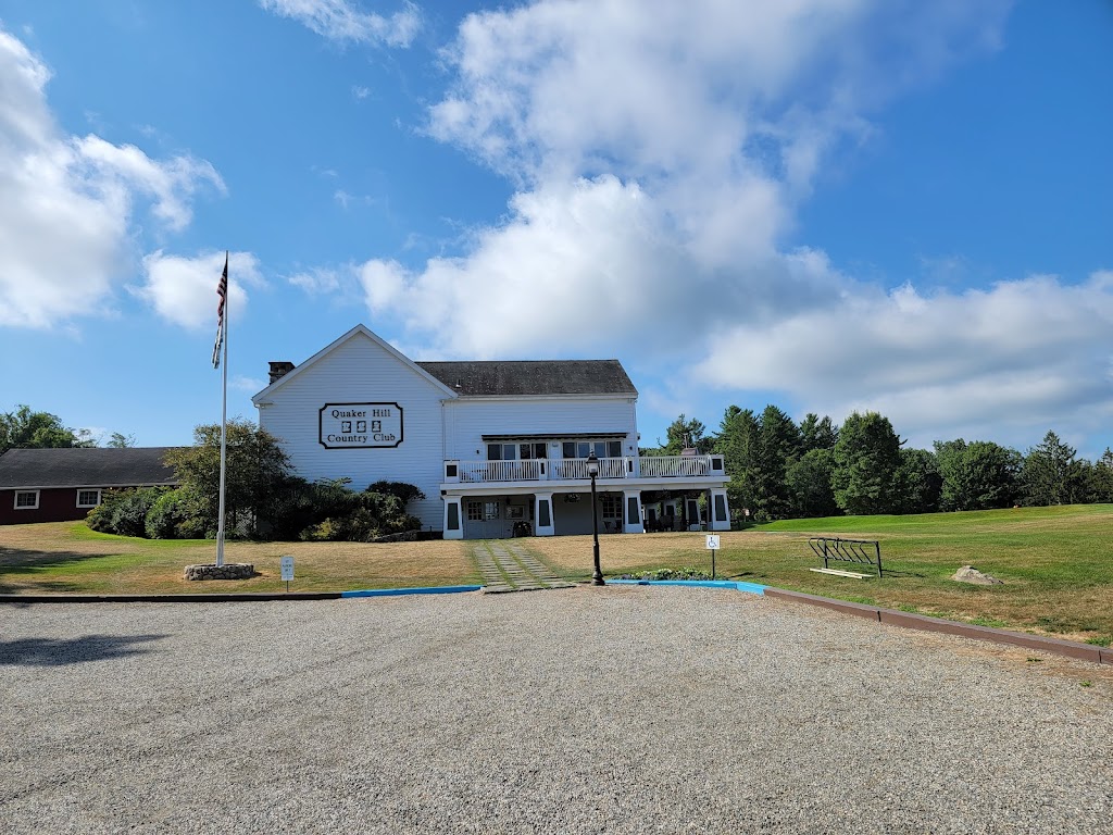 Panoramic view of a lush green golf course at Quaker Hill Country Club. Smooth