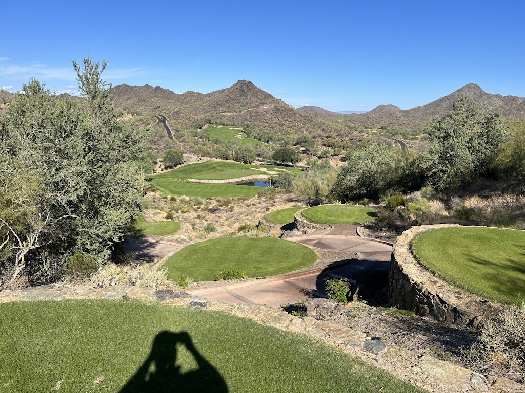 Panoramic view of a lush green golf course at Quintero Golf Club. Smooth