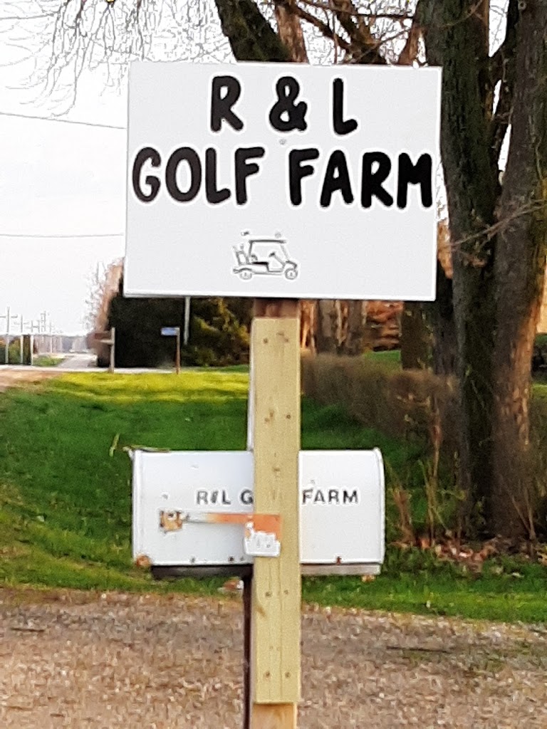 Panoramic view of a lush green golf course at R & L Golf Farm. Smooth