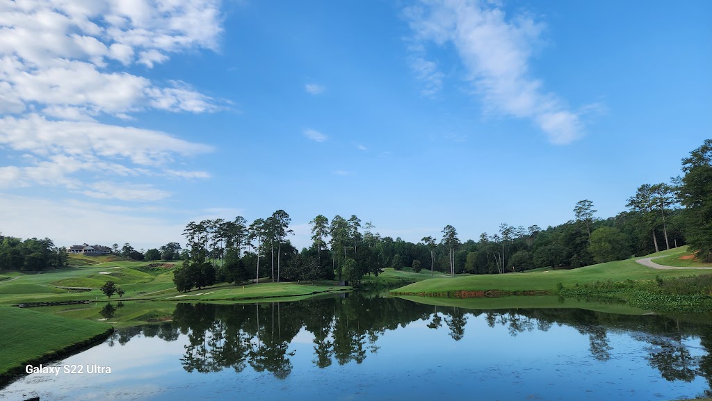 Panoramic view of a lush green golf course at RTJ Golf Trail at Cambrian Ridge. Smooth