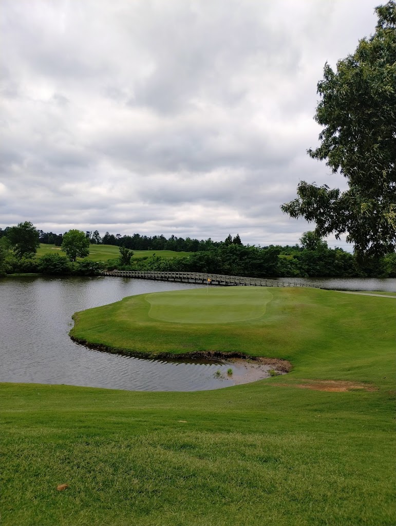 Panoramic view of a lush green golf course at RTJ Golf Trail at Silver Lakes. Smooth