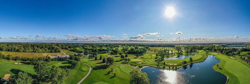 Panoramic view of a lush green golf course at Randall Oaks Golf Club & Banquets. Smooth
