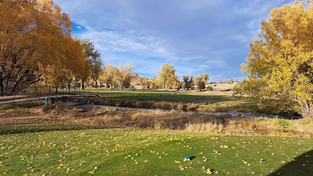Panoramic view of a lush green golf course at Rapid City Executive Golf. Smooth